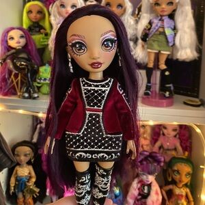 Rainbow high OOAK eyes swapped / hair dyed purple Mila Berrymore.